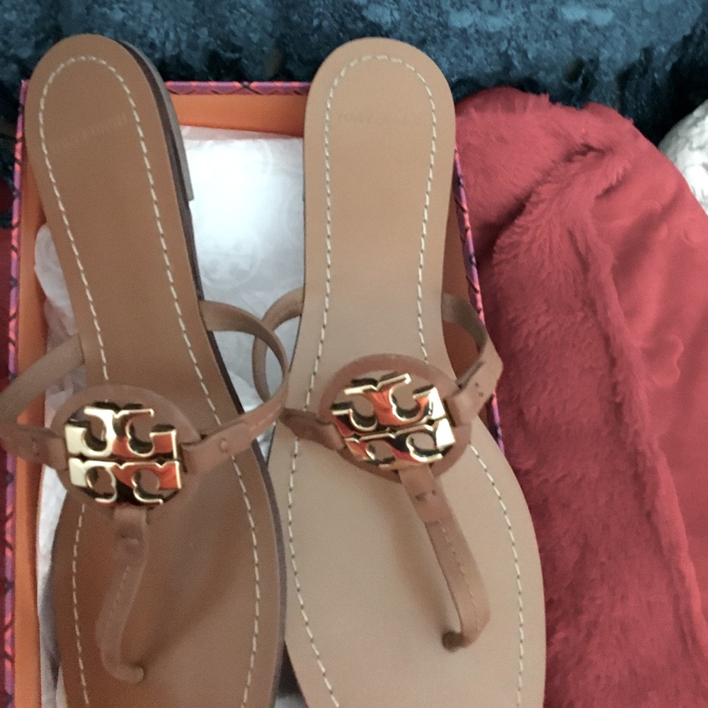 Tory Burch Sandals worn a handful of time still in excellent condition.